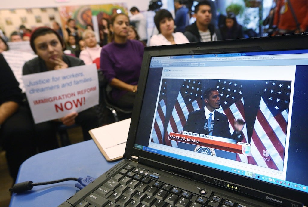 U.S. President Barack Obama's speech on immigration is played on a computer screen during a watch party held by an immigrant rights group on January 29, 2013 in the Queens borough of New York City. Obama called for immigration reform and a 'pathway to citizenship' for the nation's 11 million undocumented immigrants. (Photo by Mario Tama/Getty Images)