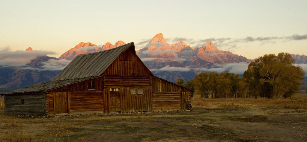 The sun hits the tips of the Grand Tetons October 5, 2012 in the Grand Teton National Park in Wyoming