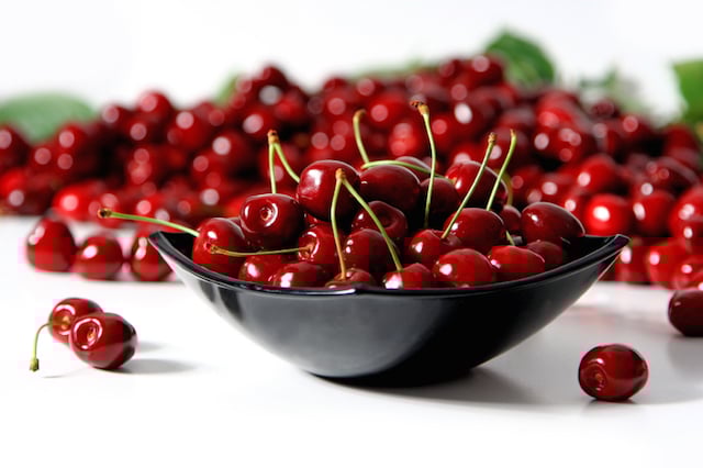 Red cherries in a bowl