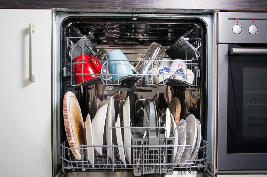 A dishwasher full of dirty dishes