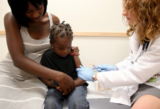 vaccine doctor child pediatrician Getty Images
