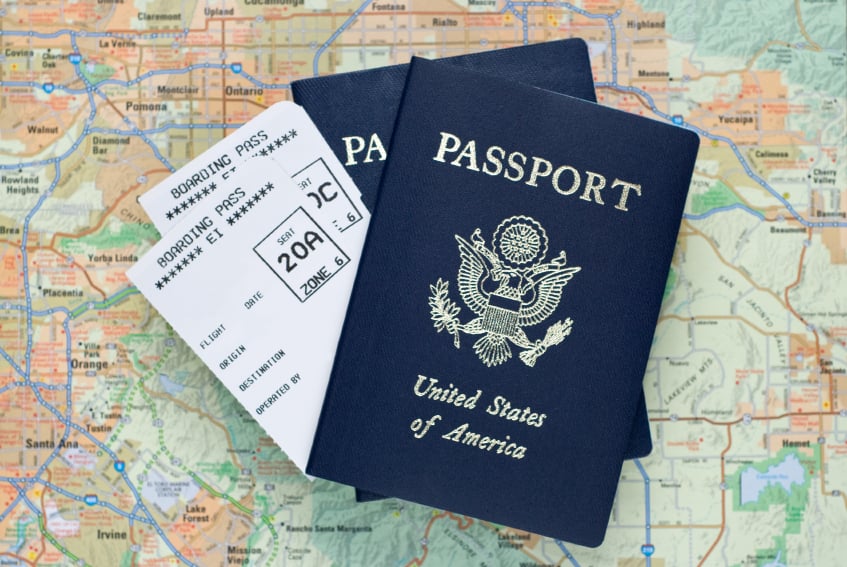 Airplane boarding passes, passport, travel, map
