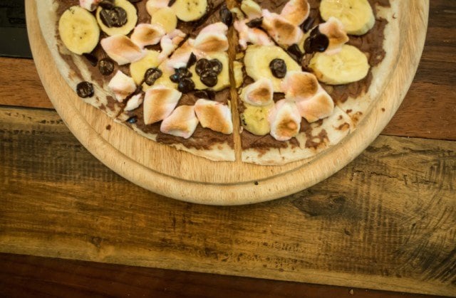 Dessert pizza with chocolate banana and marshmallow.