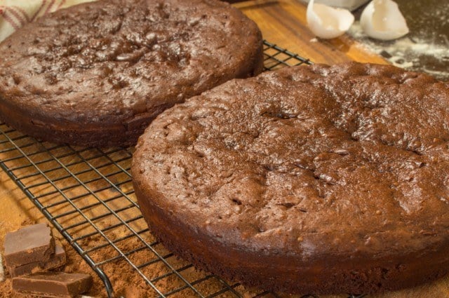 chocolate cakes cooling on cake rack