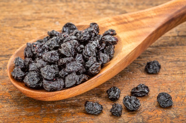dried blueberries on a spoon