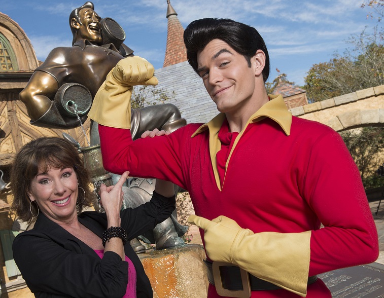 Paige O'Hara poses with Disney's "Beauty and the Beast" character Gaston