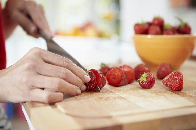 cutting strawberries