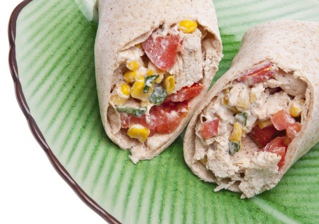 tortillas stuffed with vegetables and sauce