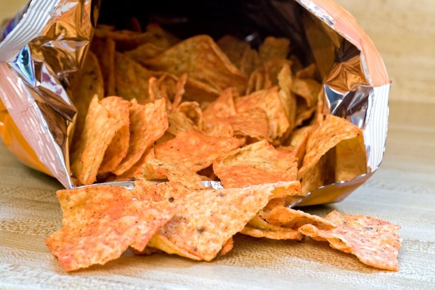 Chips coming out of a bag Chips coming out of a bag