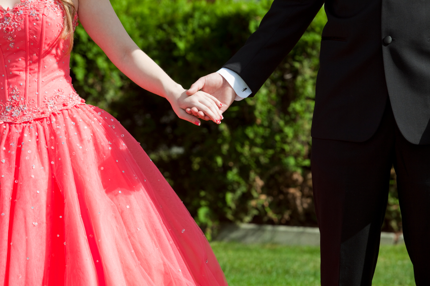 Man and woman holding hands