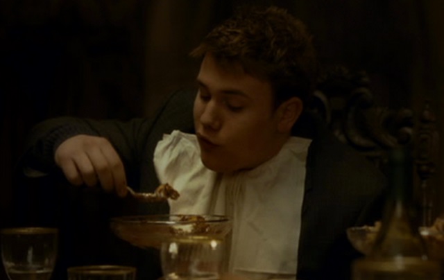 Rob Knox eating with a spoon in Harry Potter and the Half-Blood Prince