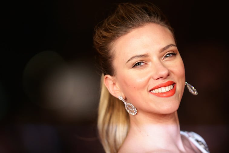 Scarlett Johansson with her hair in a ponytail smiling