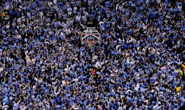 a huge crowd at a basketball game