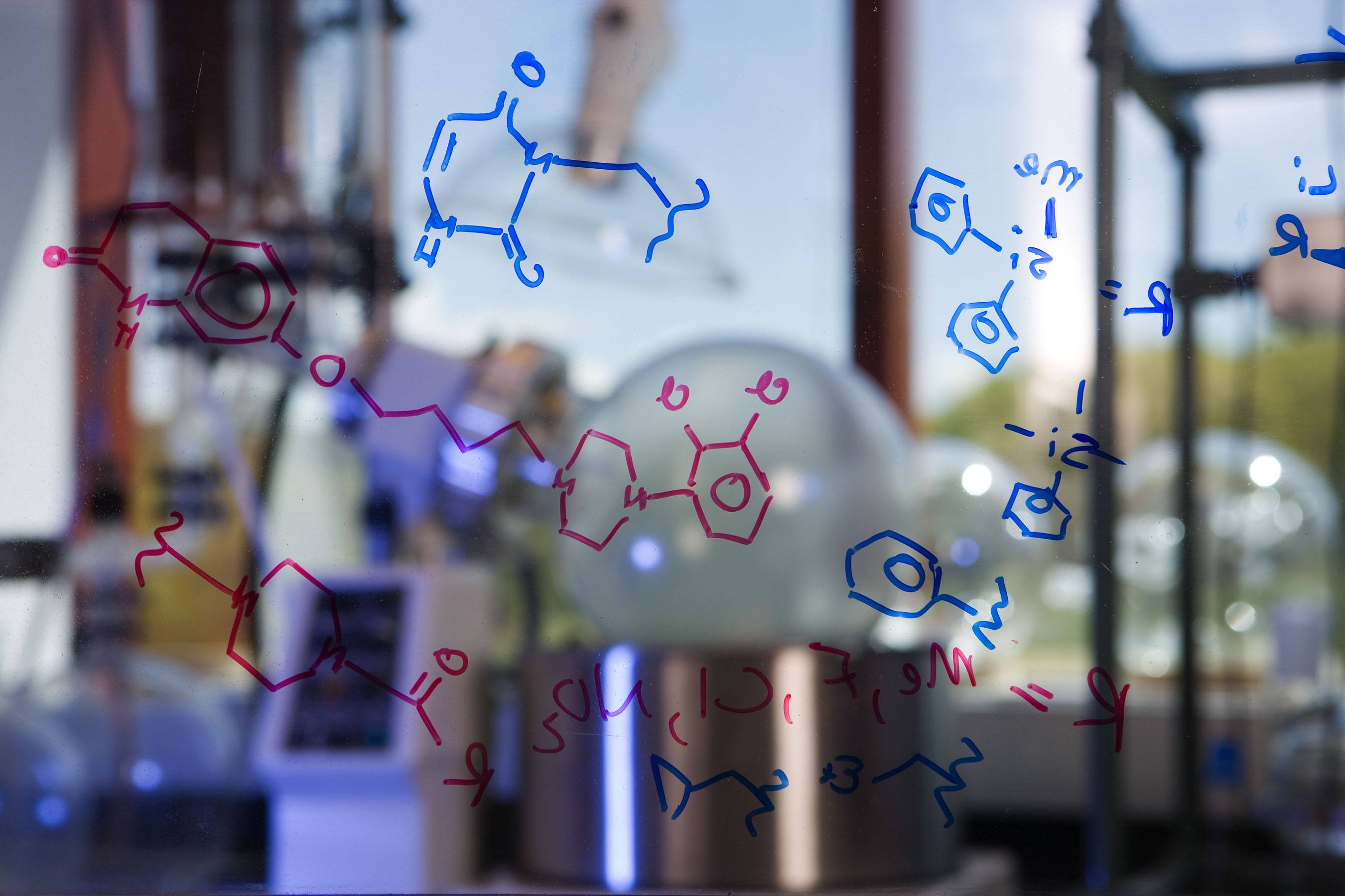 Chemical formulas written on glass