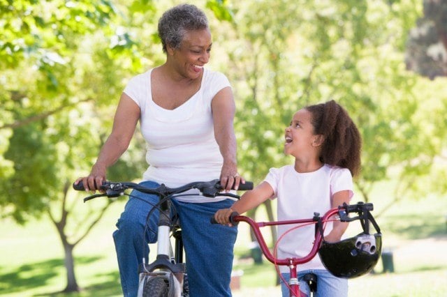 woman and child riding bikes