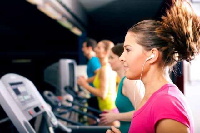 people exercising on a treadmill