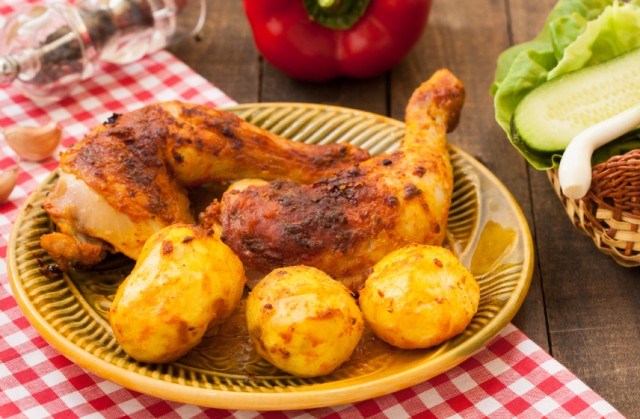 roast chicken and potatoes on a plate