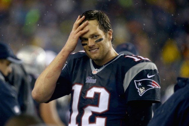 Tom Brady #12 of the New England Patriots reacts against the Indianapolis Colts of the 2015 AFC Championship Game at Gillette Stadium on January 18, 2015 in Foxboro, Massachusetts. Tom Brady #12 of the New England Patriots reacts against the Indianapolis Colts of the 2015 AFC Championship Game at Gillette Stadium on January 18, 2015 in Foxboro, Massachusetts.