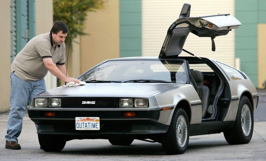 MELBOURNE, AUSTRALIA: (FILES) Wayne Gillard polishes up his 1981 DeLorean DMC 12, one of only six in Australia and up for auction at a novelty auction, seen in this 15 July 2004 file photo in Melbourne. John DeLorean, an innovative automaker who left a promising career in Detroit, Michigan to develop the short-lived gull-winged sports cars died 19 March, 2005 in a New Jersey hospital at the age of 80 due to complications of a recent stroke. AFP PHOTO/William WEST (Photo credit should read WILLIAM WEST/AFP/Getty Images)