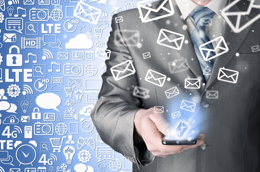 A man with constant emails flooding his inbox