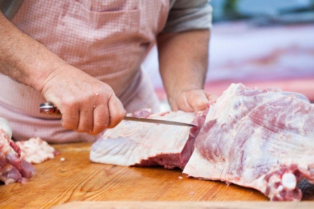 butcher, cutting meat