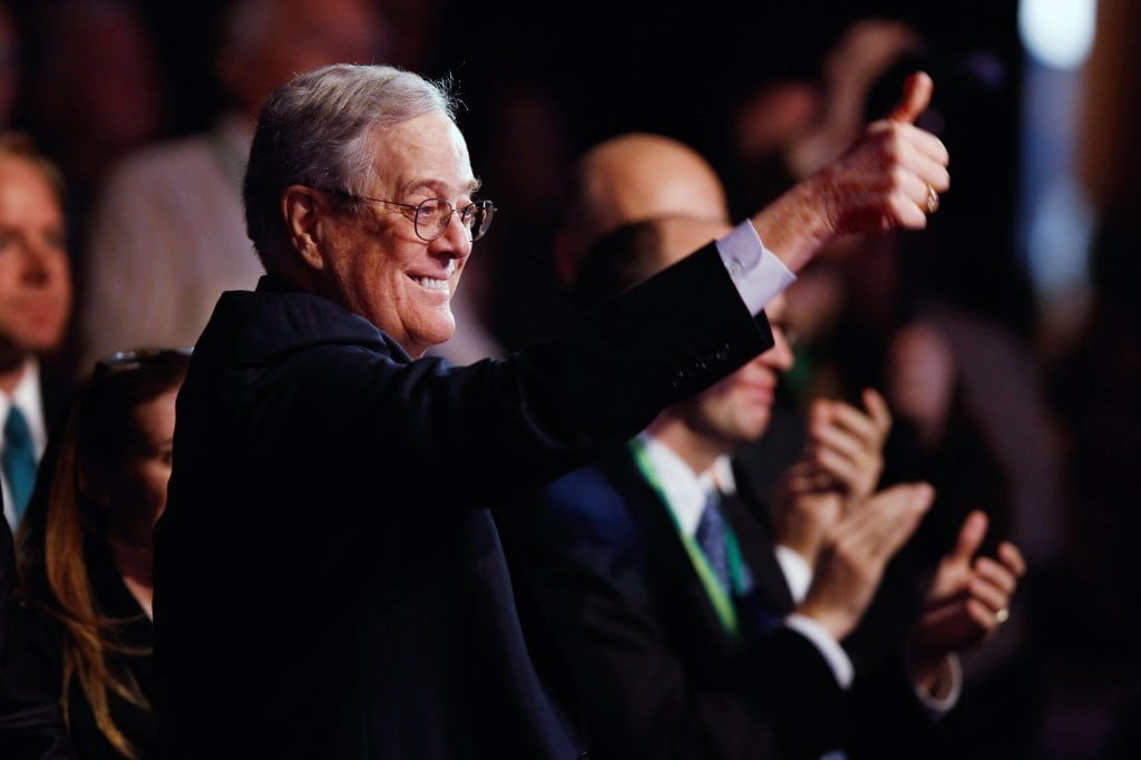 Shot of David Koch, CEO of Koch Industries, giving the thumbs-up to the crowd in 2015.