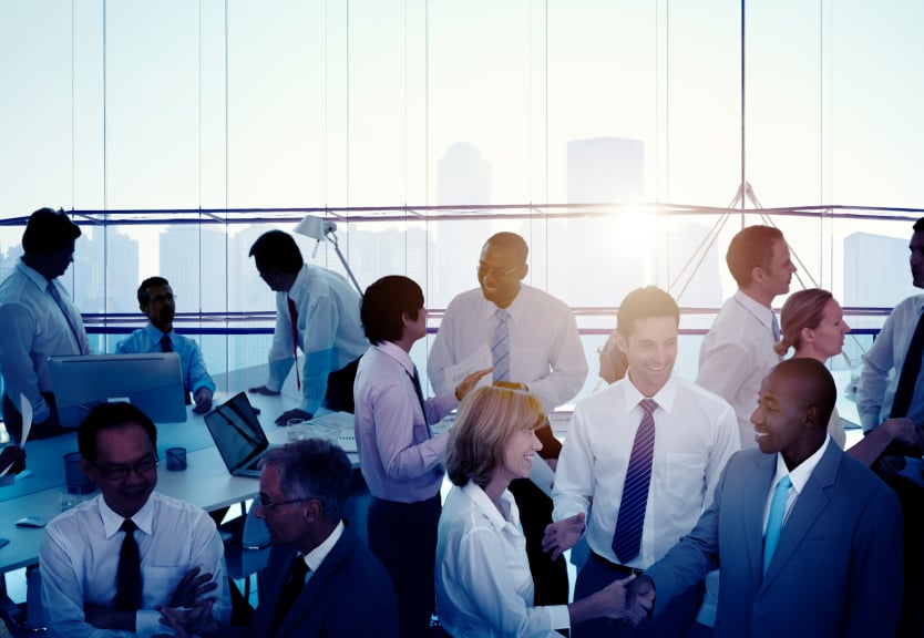 A group of business professionals, all of whom seem to fit in with each other