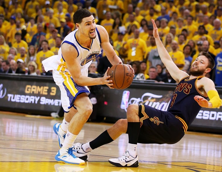 Dellavedova falls down during Game Two of the 2015 NBA Finals at ORACLE Arena on June 7, 2015 in Oakland, California.