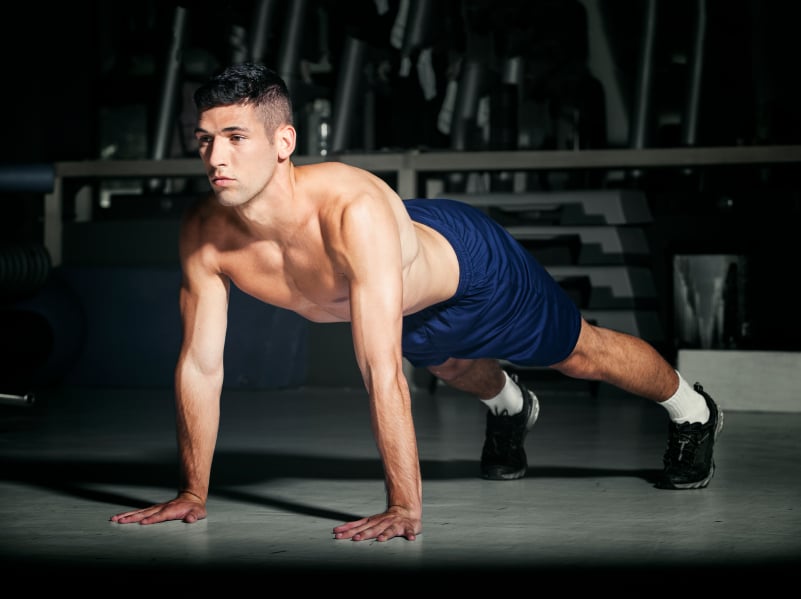 Man in starting plank position