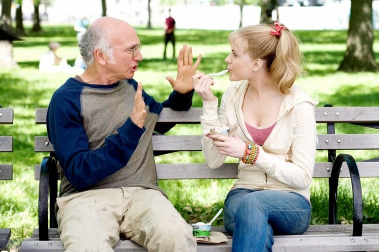 Larry David is talking to Nicole Patrick as she eats yogurt in 'Whatever Works.'