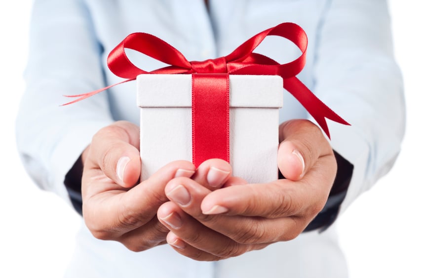 A man holding a gift