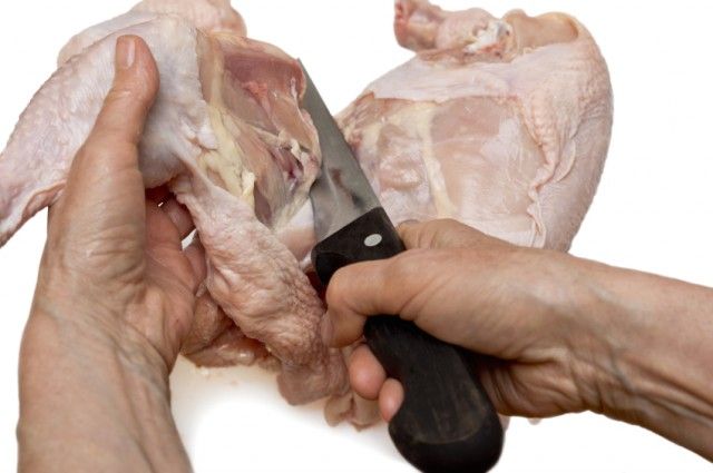 cutting chicken