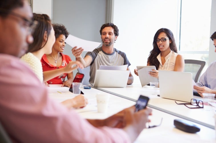 younger workers at meeting