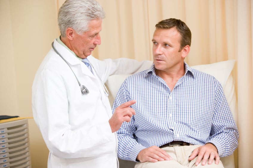 Man talking to his doctor