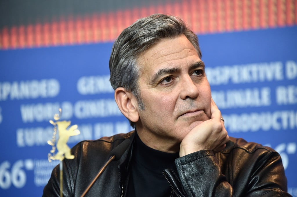 Actor George Clooney looking to the side.  Actor George Clooney looking to the side.