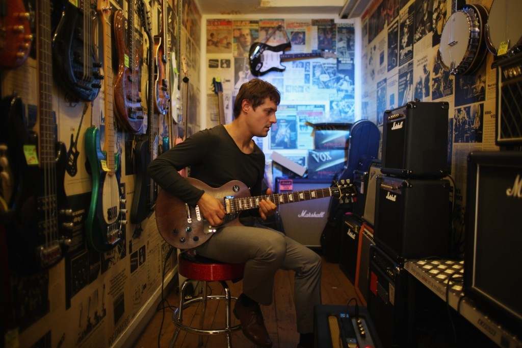 man playing guitar man playing guitar