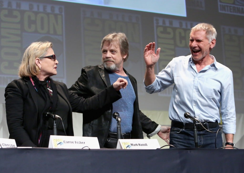 (L-R): Carrie Fisher, Mark Hamill, and Harrison Ford on stage at San Diego Comic-Con