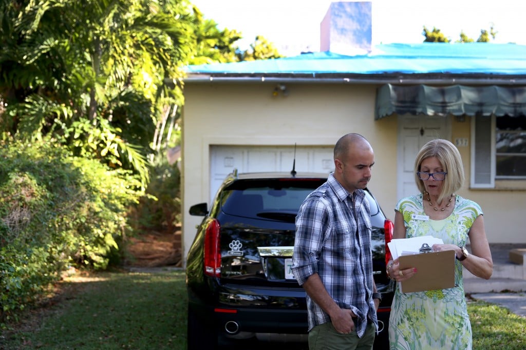 A real estate agent and client
