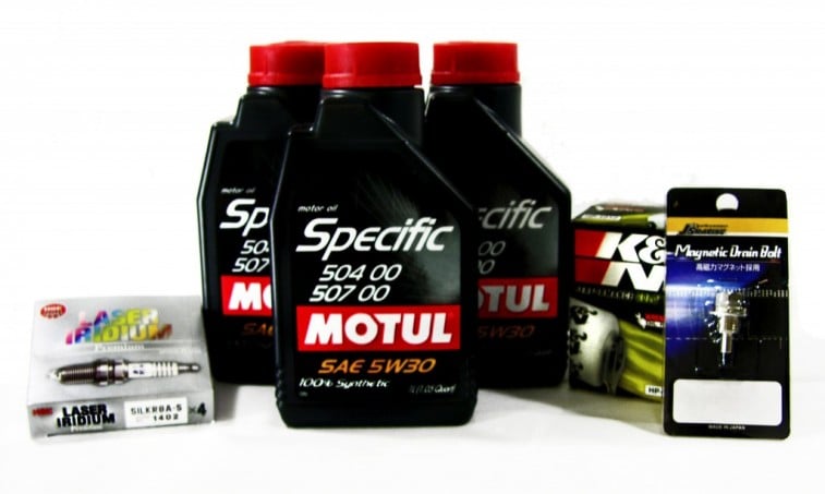 A typical automobile tune up includes everything pictured here, plus a fresh air filter