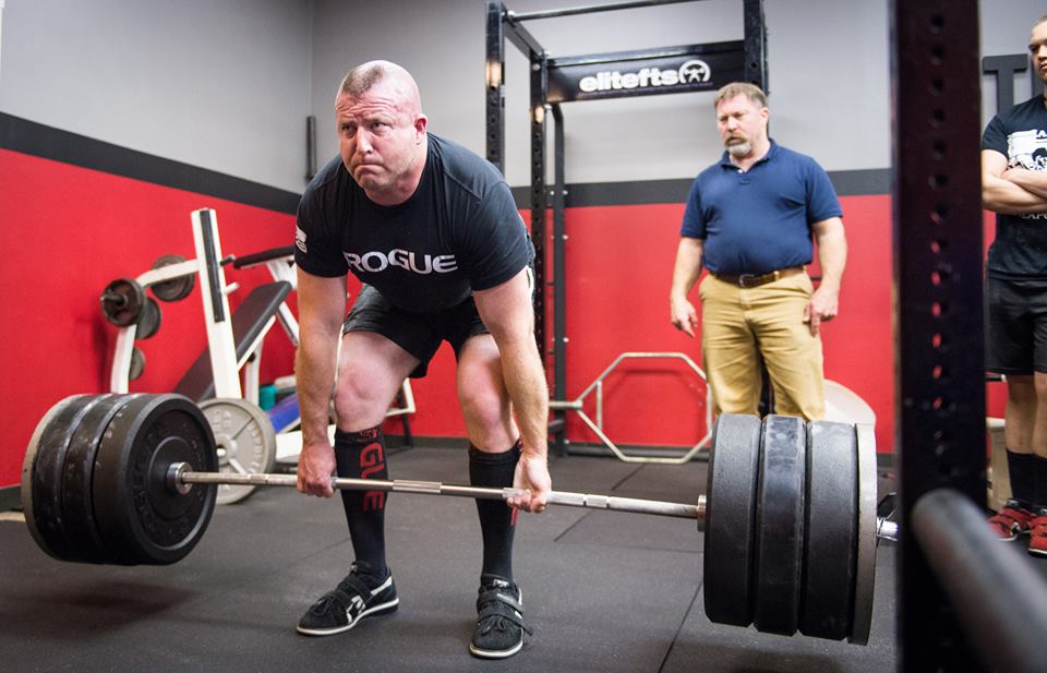 a man lifting weights