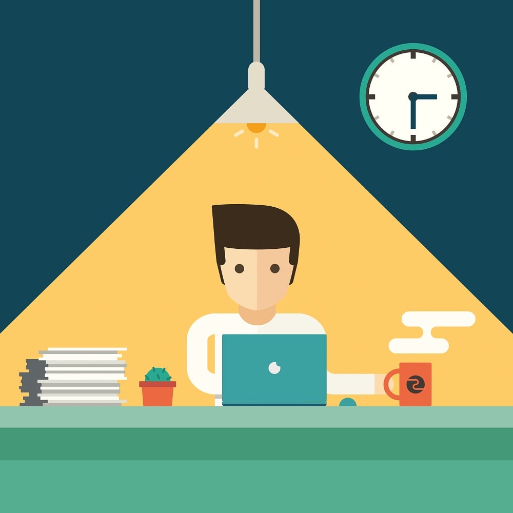 Man working late with coffee