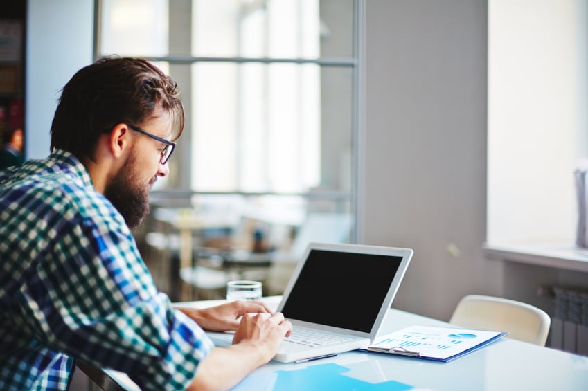 man using laptop