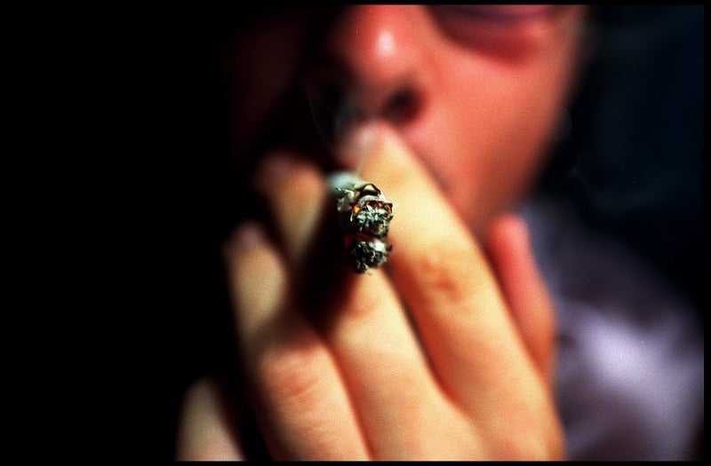 A man smoking marijuana