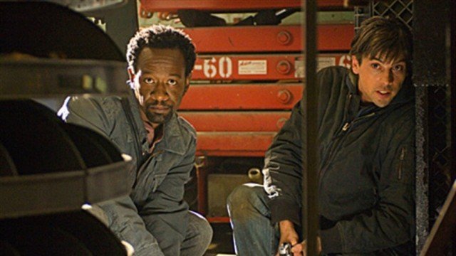 Two men hiding and holding weapons in 'Jericho'. Two men hiding and holding weapons in 'Jericho'.