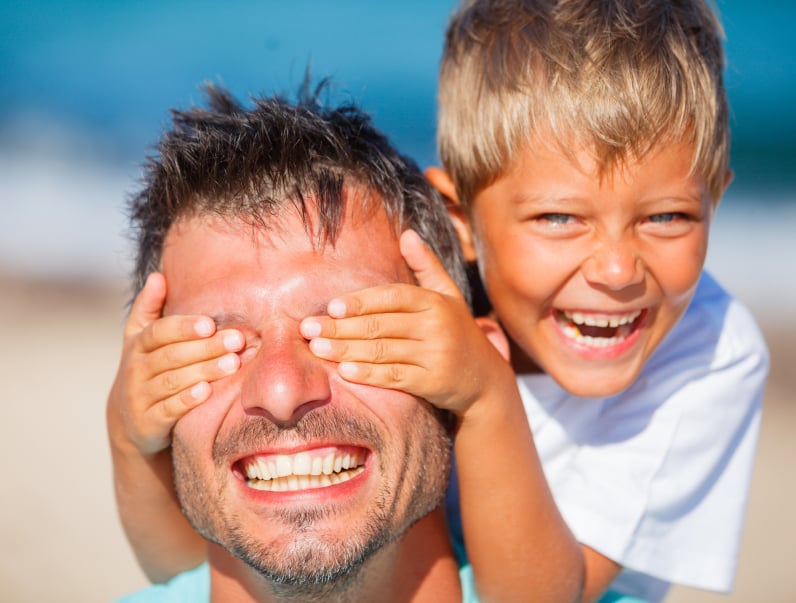 boy with father playing at the beach, kids, laughing