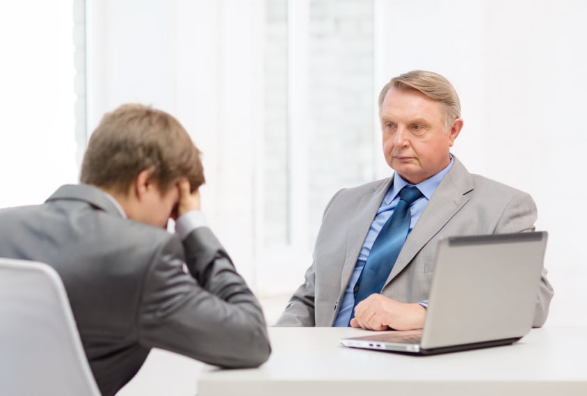 A young man feigning weakness to improve his position
