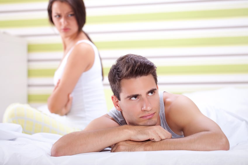 frustrated couple together in a bedroom