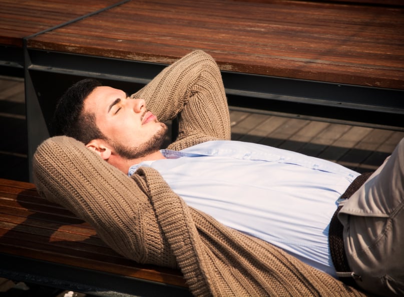 man relaxing in a sweater