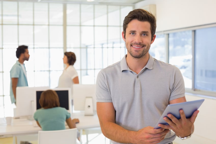 man holding a tablet
