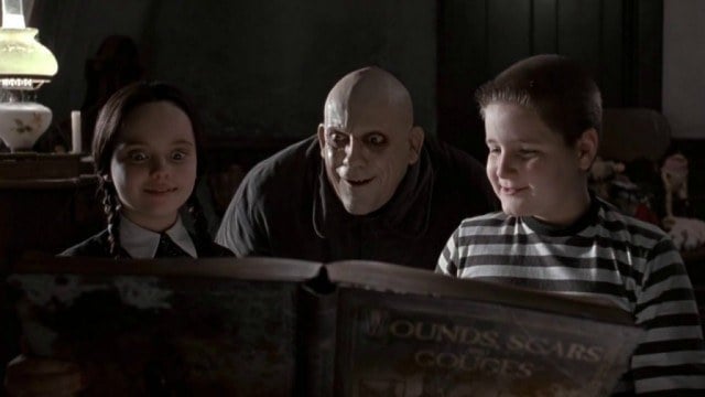 Christina Ricci, Christopher Lloyd and Jimmy Workman in 'The Addams Family'